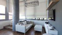 Posezení v ubytování View Skyscraper Bata - loft XL