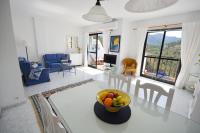 A seating area at Apartamento la vista, Frigiliana 2 bedroom apartment with amazing views, pool and free private parking HansOnHoliday Rentals
