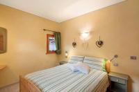 A bed or beds in a room at Terra Chalet Martina