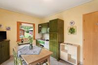 A kitchen or kitchenette at Terra Chalet Martina