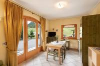 A television and/or entertainment centre at Terra Chalet Martina