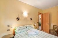 A bed or beds in a room at Terra Chalet Martina