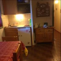Kuchnia lub aneks kuchenny w obiekcie Chatel au pied des pistes