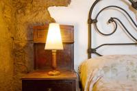 Postel nebo postele na pokoji v ubytování Casa Rural - Ländliches Haus, Pepita La De Las Flores