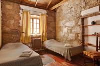 Postel nebo postele na pokoji v ubytování Casa Rural - Ländliches Haus, Pepita La De Las Flores