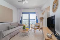 Televízia a/alebo spoločenská miestnosť v ubytovaní Greek Beach House Complex A5
