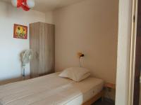 Posteľ alebo postele v izbe v ubytovaní Appartement T3 avec balcon et parking, accès piscine, espaces sportifs - FR-1-195-96