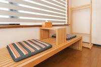 a wooden bench in a room with a window at 檜木居民宿 - 立案證號 一六三 - 一六八 - 一七零 in Ji&#39;an