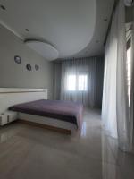 Postel nebo postele na pokoji v ubytování Kavala silver apartment