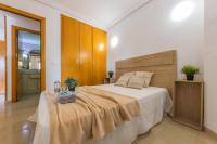 Postel nebo postele na pokoji v ubytování Apartamento con piscina a 250m de la playa