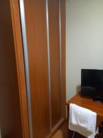Televízia a/alebo spoločenská miestnosť v ubytovaní Pension San Roque
