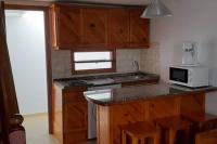 A kitchen or kitchenette at Casa Teresa. Duplex en Maspalomas