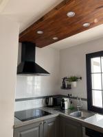 Kuchyň nebo kuchyňský kout v ubytování Exclusiva Villa de Lujo (5*****) en Corralejo - Fuerteventura (Islas Canarias)