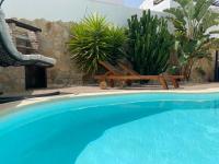 Bazén v ubytování Exclusiva Villa de Lujo (5*****) en Corralejo - Fuerteventura (Islas Canarias) nebo v jeho okolí