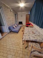 Televízia a/alebo spoločenská miestnosť v ubytovaní Jozefina Apartment