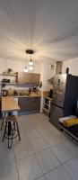 Kuchyňa alebo kuchynka v ubytovaní Superbe appartement COSY