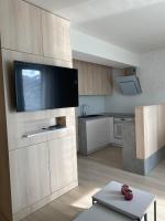 Kuchyňa alebo kuchynka v ubytovaní Apartman Hestia