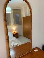 Posteľ alebo postele v izbe v ubytovaní Efi’s Apartment Nea Michaniona