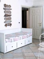 A bed or beds in a room at MIMI'S HOME casa per vacanze