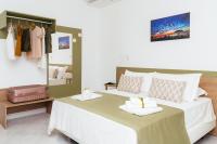 A bed or beds in a room at La Pigna Sorrento