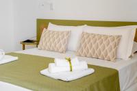 A bed or beds in a room at La Pigna Sorrento