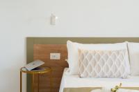 A bed or beds in a room at La Pigna Sorrento