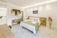 A bed or beds in a room at La Pigna Sorrento