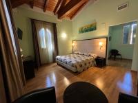 Posteľ alebo postele v izbe v ubytovaní Villa Clorè Hotel & Spa