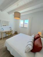 Postel nebo postele na pokoji v ubytování Casahost Villa Dolce Vita