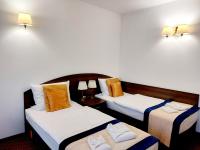 Posteľ alebo postele v izbe v ubytovaní Hotel u Liska