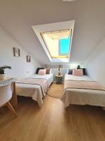 Postel nebo postele na pokoji v ubytování apartamento Fisterra house Finisterre