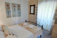 Posteľ alebo postele v izbe v ubytovaní Holiday house with a parking space Skrbcici, Krk - 16084