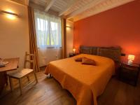 Łóżko lub łóżka w pokoju w obiekcie Agriturismo Torsivì