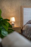 Łóżko lub łóżka w pokoju w obiekcie Le Place Du Bourg Appartement T2 Centre Historique Rodez