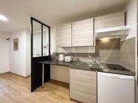 Kuchnia lub aneks kuchenny w obiekcie Le Place Du Bourg Appartement T2 Centre Historique Rodez