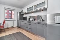 Kuchyňa alebo kuchynka v ubytovaní Apartament Spiżowa z Balkonem Wrocław by Noclegi Renters