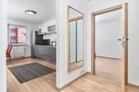 Kuchyňa alebo kuchynka v ubytovaní Apartament Spiżowa z Balkonem Wrocław by Noclegi Renters