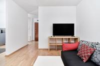 Televízia a/alebo spoločenská miestnosť v ubytovaní Apartament Spiżowa z Balkonem Wrocław by Noclegi Renters