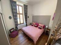 Łóżko lub łóżka w pokoju w obiekcie Magnifique appartement 8 couchages dans villa historique