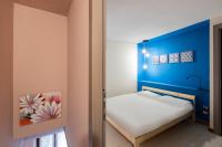 Łóżko lub łóżka w pokoju w obiekcie Donna Elena - Apartment