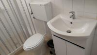 A bathroom at Vasileiou Apartments