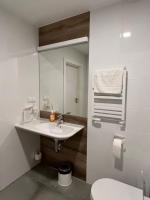 Kúpeľňa v ubytovaní Aparthotel Apartamenty Czarna Góra 410
