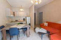 A kitchen or kitchenette at Vasileiou Apartments