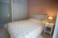 A bed or beds in a room at Vasileiou Apartments