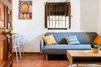 Część wypoczynkowa w obiekcie Home4u Casa del Tesoro I