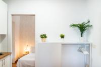 Łóżko lub łóżka w pokoju w obiekcie Home4u Casa del Tesoro I