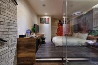 Hotels Here - Taipeiにあるベッド