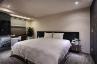 Hotels Here - Taipeiにあるベッド