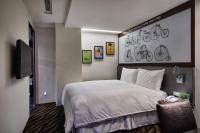 Hotels Here - Taipeiにあるベッド