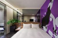 Hotels Here - Taipeiにあるベッド